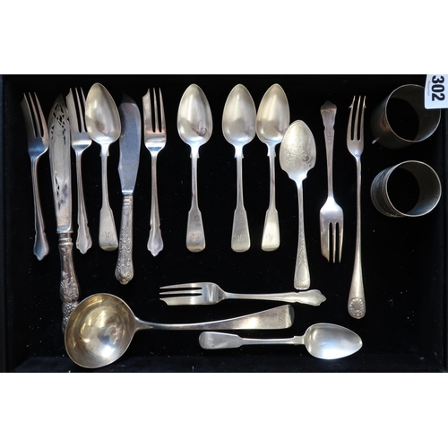 302 - A Group Georgian & Victorian Silver Spoons, Forks, and Napkin rings. 

Weight: 450g/14.46ozt