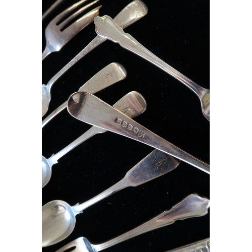 302 - A Group Georgian & Victorian Silver Spoons, Forks, and Napkin rings. 

Weight: 450g/14.46ozt