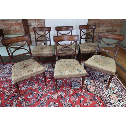 629 - A set of six 19th century flame mahogany dining chairs with needlepoint seats - in good condition