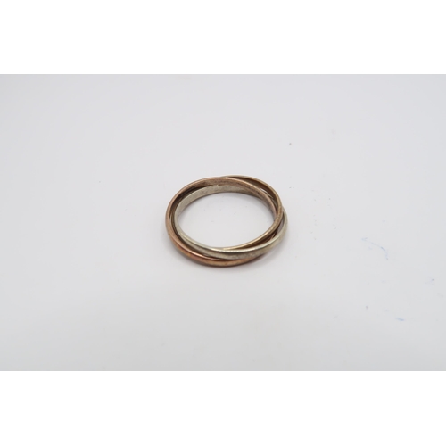74 - A 9ct three colour 'Russian' wedding band. Weight: 3.14g