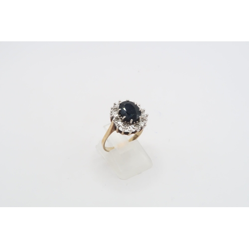 40 - A 9ct gold sapphire and diamond cluster ring. Size P 1/2. Weight3.67 grams