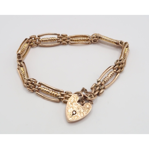 70 - A 9ct Fancy Link Gate Bracelet

Weight: 11.66g