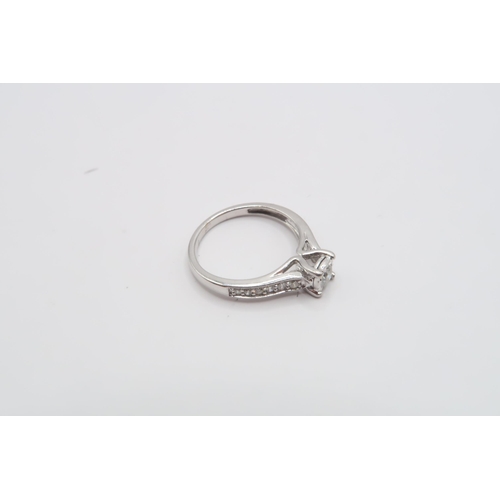 157 - A 14ct White Gold (tested) Diamond Solitaire Ring with 12 Diamonds to the Shoulder, Diamonds are Bri... 