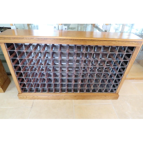590 - A good quality oak wine rack holding 120 bottles&nbsp;- made by a local craftsman to a high standard... 