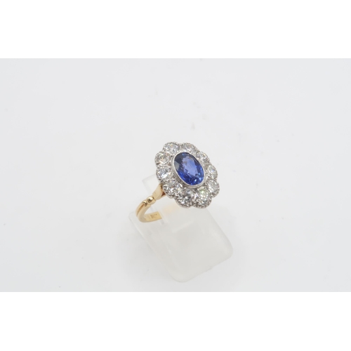 28 - A Fine Quality Platinum and 18ct Yellow Gold Oval Sapphire and Diamond Ring, Sapphire is a Very Good... 