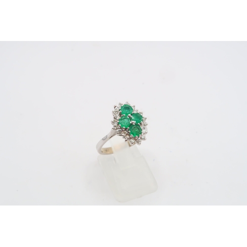 30 - An 18ct White Gold Emerald and Diamond Ring, Emeralds are a Good Colour with Natural Inclusions, Dia... 