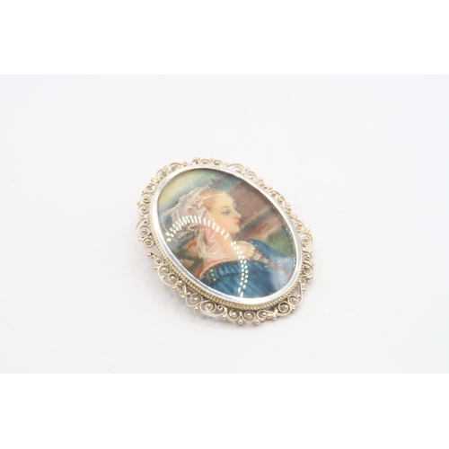 37 - A Vintage Continental Silver (800), Oval Pendant Brooch with a Hand painted Miniature Of a Young Lad... 