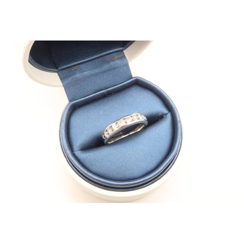 10 - A Platinum Diamond 9 Stone Diamond Eternity Ring, 1ct Total Diamond Weight. Weight: 8g Size: R 1/2 C... 