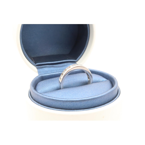 10 - A Platinum Diamond 9 Stone Diamond Eternity Ring, 1ct Total Diamond Weight. Weight: 8g Size: R 1/2 C... 