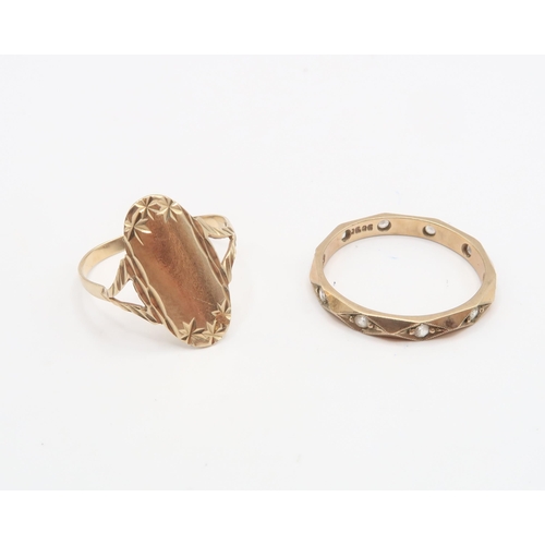 102 - A Pair of 9ct Rings to include Ring with elongate Oval Head and a faceted white stone full eternity.... 