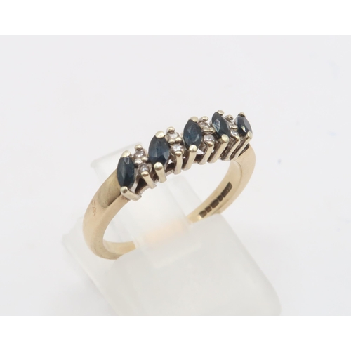 105 - A 9ct Sapphire & Diamond Marquise Cut Sapphire Eternity.&nbsp;Weight 2.85g Size: L 1/2Condition:... 