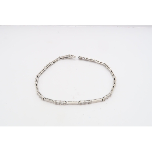 112 - A 9ct Diamond Bar Link Bracelet, Composed of alternating polished and diamond Illusion set rectangul... 