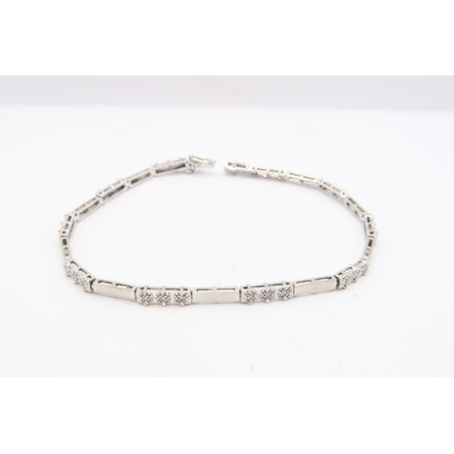 112 - A 9ct Diamond Bar Link Bracelet, Composed of alternating polished and diamond Illusion set rectangul... 