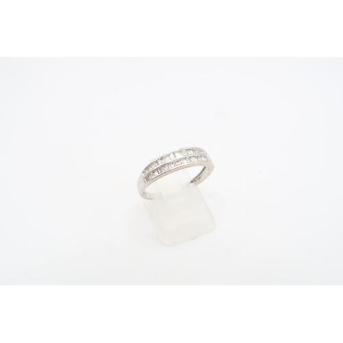 114 - A 9ct White Gold Double Row Eternity ring, featuring round and Tapered baguette cut diamonds. .33ctW... 