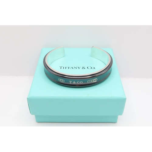115 - A Tiffany & Co Sterling Silver Cuff BangleWeight: 34.7g 6.5cm Internal Width