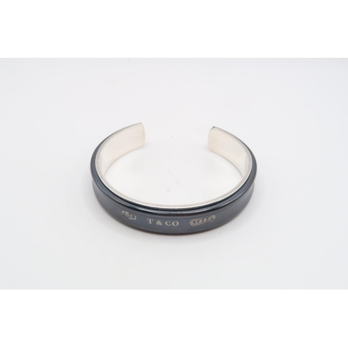 115 - A Tiffany & Co Sterling Silver Cuff BangleWeight: 34.7g 6.5cm Internal Width