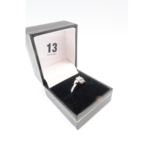 13 - An 18ct white gold diamond ring size M - approx weight 3.7 grams