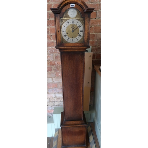 568 - An Eight Day 3 Train Grandmother Clock, Featuring a brass engraved dial marked 'Tempus Fugit'.