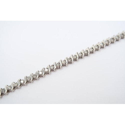 9 - A 10ct 'S' Link Design Diamond 'Tennis' Bracelet Bracelet. Featuring 48 Individual Claw Set Diamonds... 