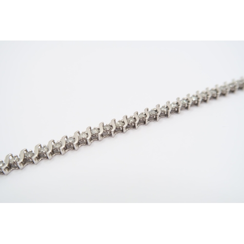 9 - A 10ct 'S' Link Design Diamond 'Tennis' Bracelet Bracelet. Featuring 48 Individual Claw Set Diamonds... 