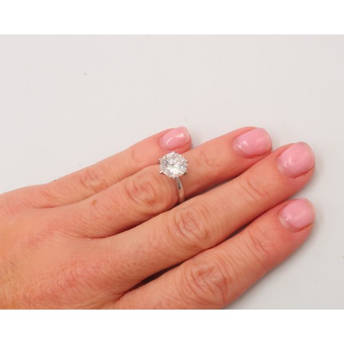 1 - A brilliant cut diamond solitaire ring. Estimated 2.77cts. Estimated E/F colour, VS2/SI1 clarity. Si... 