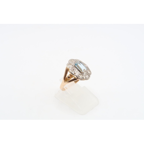 54 - An aquamarine and diamond cluster ring. Tests gold 18ct. Size K 1/2. Weight 3.28 grams&nbsp;