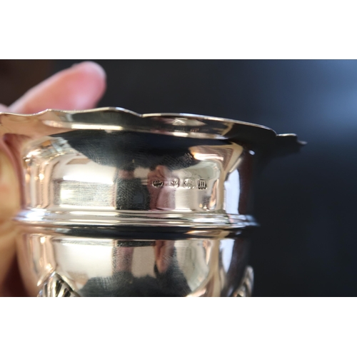 315 - A Sterling Silver Open Salt Dish, Featuring a flared cauldron shaped design resting on three hoofed ... 