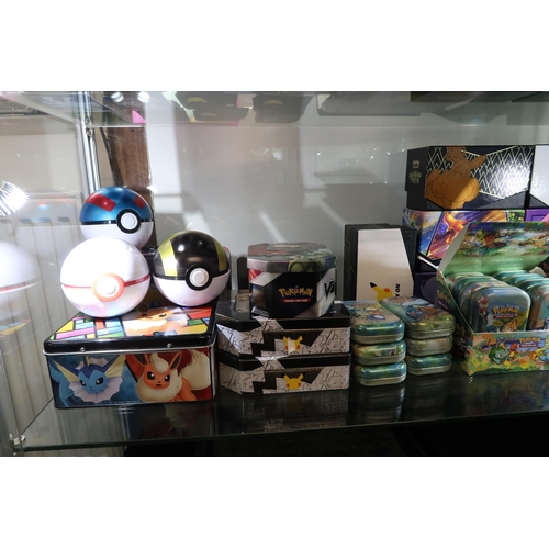 506 - A Miscellaneous group of Pokémon Tins, Boxes and cases from different issues such as 25th Celebratio... 