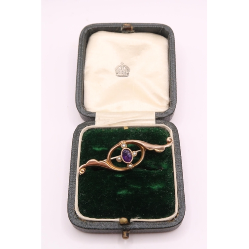 136 - A 9ct Ornate Edwardian Amethyst and seed pearl broochWeight: 1.74g Condition: Slight damage to ameth... 