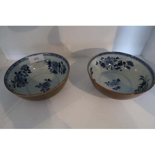  A pair of Nanking Cargo bowls, Qianlong, interior with floral sprays painted in blue, the exterior w... 