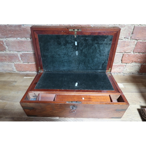  A good quality 19th century flame mahogany brass bound writing box with its key, estucheon missing o... 