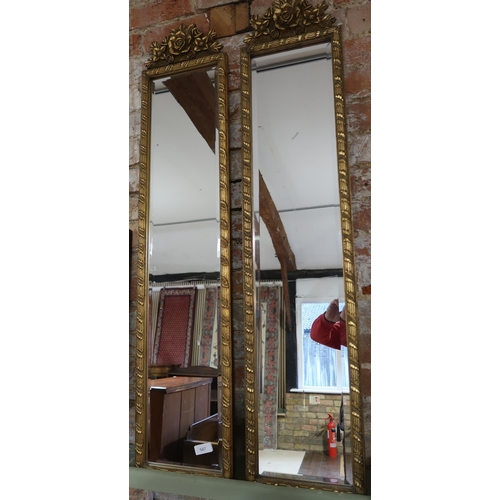  A pair of mirrors with bevelled edge glass each measuring 120cm high x 27cm wide