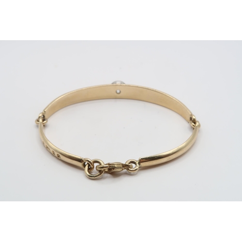 20 - A 9ct bi colour bracelet collet set with a brilliant cut diamond. Estimated 1.60cts I/J colour, SI2/... 