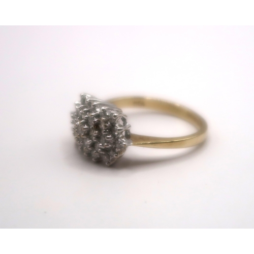 23 - A 9ct gold brilliant cut diamond cluster ring. Stated 0.50ct. Size M. Weight 2.86 grams.