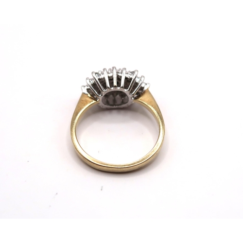 23 - A 9ct gold brilliant cut diamond cluster ring. Stated 0.50ct. Size M. Weight 2.86 grams.