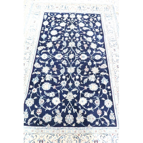 A hand knotted woollen Fine Nain rug - 2.50m x 1.70m