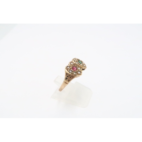 10 - A 9ct gold emerald. ruby and seed pearl sweet heart ring. Size P. Weight 3.14 grams