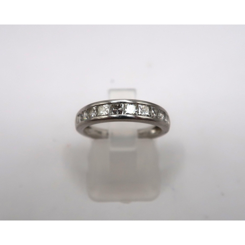 25 - A Platinum Princess Cut Diamond Channel Set Eternity Ring, 1ct Approximate DIA Content. Weight: 4.6g... 