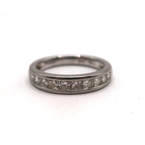 25 - A Platinum Princess Cut Diamond Channel Set Eternity Ring, 1ct Approximate DIA Content. Weight: 4.6g... 