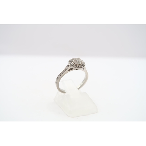 29 - A GIA Certified Platinum Diamond Halo Cluster, .50ct G SI1.&nbsp;Size: J 1/2 Weight: 3.72g Condition... 