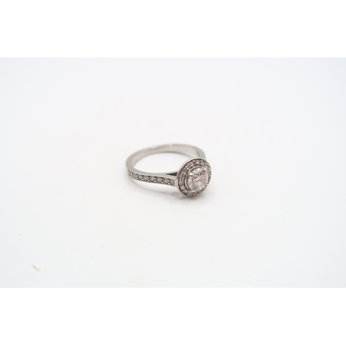 29 - A GIA Certified Platinum Diamond Halo Cluster, .50ct G SI1.&nbsp;Size: J 1/2 Weight: 3.72g Condition... 