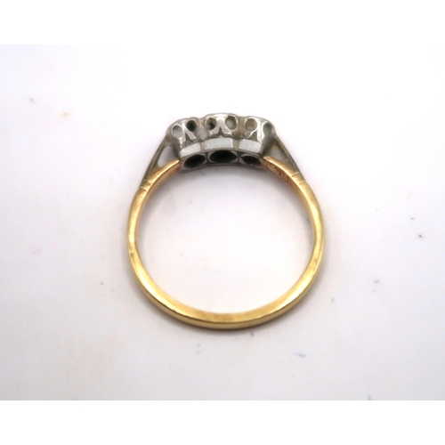 38 - A single cut diamond three stone ring. Size N. Tests gold 18ct. Weight 2.45 grams&nbsp;
