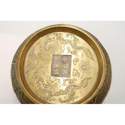 404 - A 19th Century heavy bronze Chinese censer. featuring a globular form with a flared floral engraved ... 