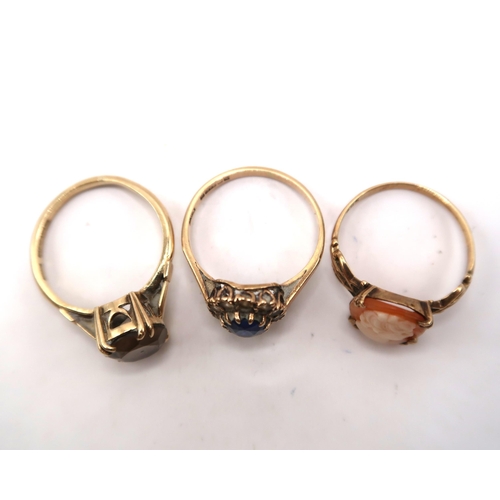 43 - Three dress rings to include a cameo ring size L, a cluster ring size L, a quartz single stone size ... 