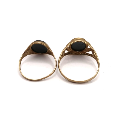 49 - Two 9ct hematite signet rings. Size V and Z1/2. Weight 6.31 grams