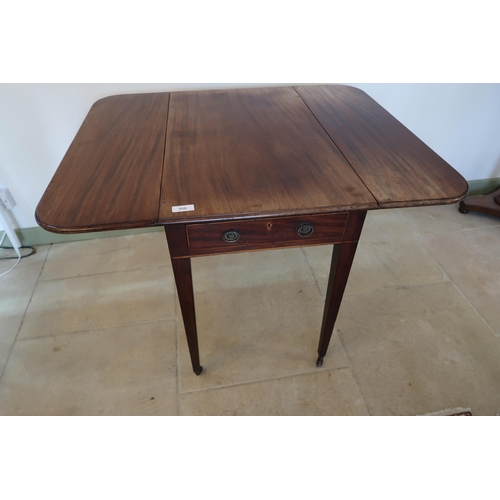 558 - A 19th century mahogany Pembrooke table