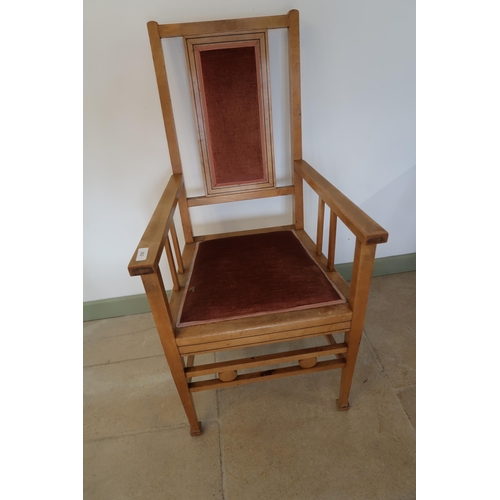 562 - An Arts and Crafts beech armchair