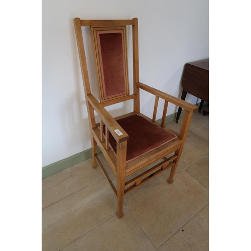562 - An Arts and Crafts beech armchair