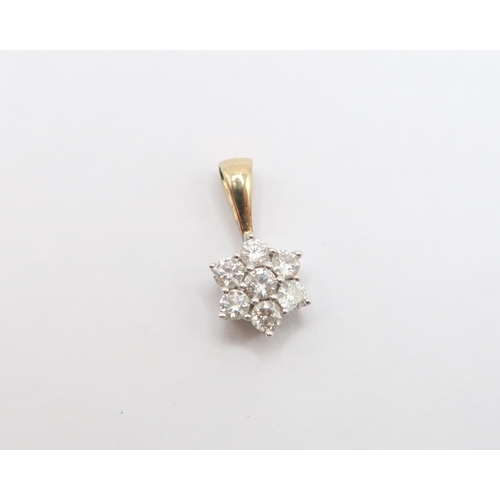 87 - A 9ct Diamond Cluster Pendant&nbsp;Weight: 0.6g 15mmx6mm