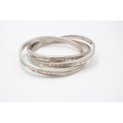 45 - A Tiffany and Co 1837 trilogy bangle. Stamped 925. Weight 76.71 grams